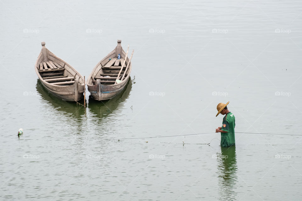 Local fishermen and his two boats