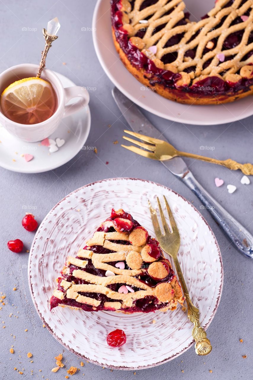 Cherry pie on a  stone background 