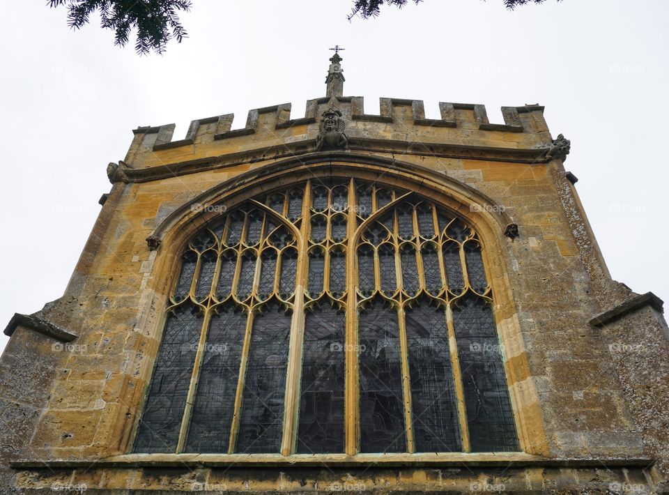 English Church ...stained glass window ..St Peters Winchcombe ... exterior shot 