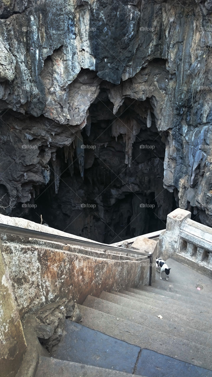 Down stairs into the temple cave.
