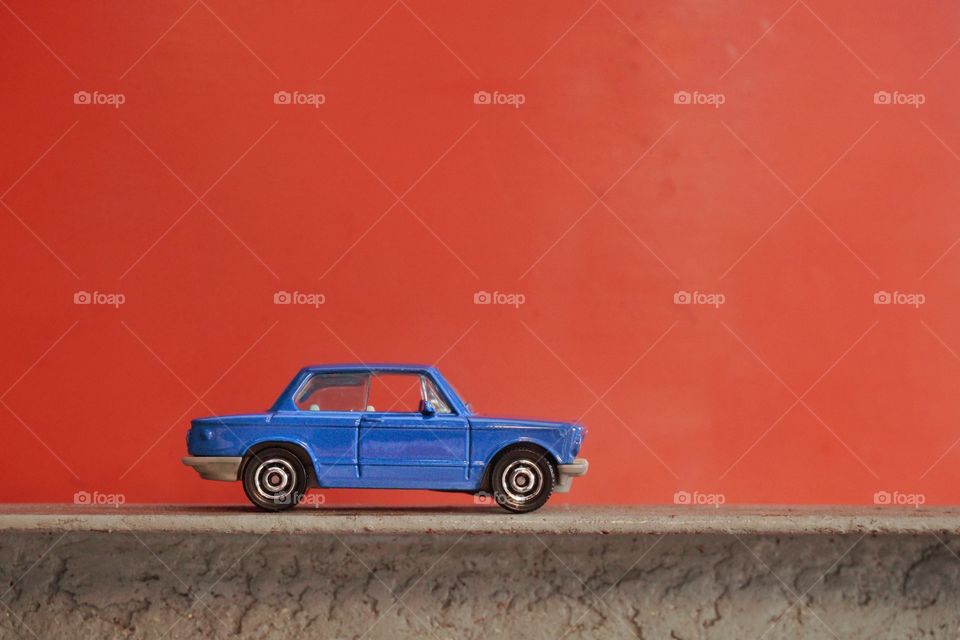 blue toys in orange background