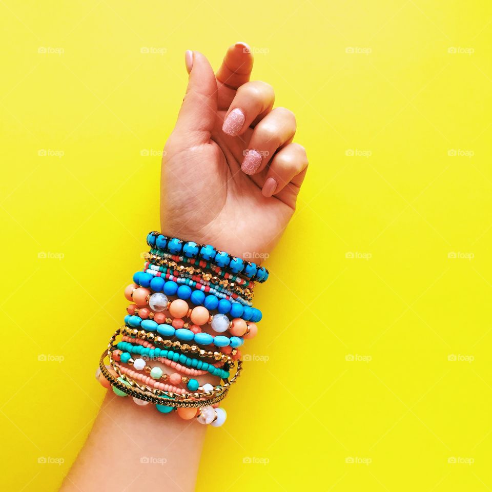 Woman hand with bracelets