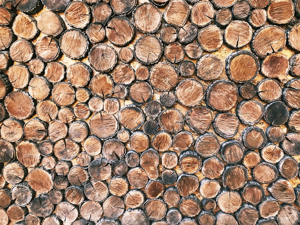 Wooden circles on wooden background 