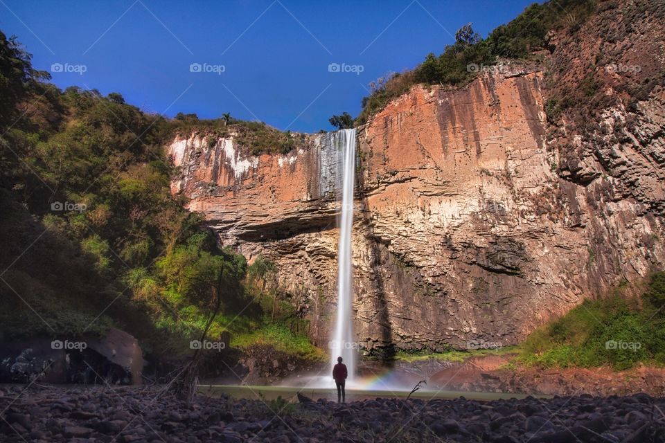 Little rainbow at waterfall