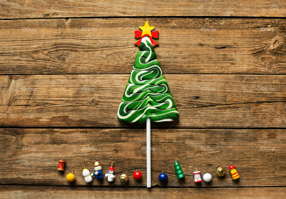 Candy with christmas ornament on table