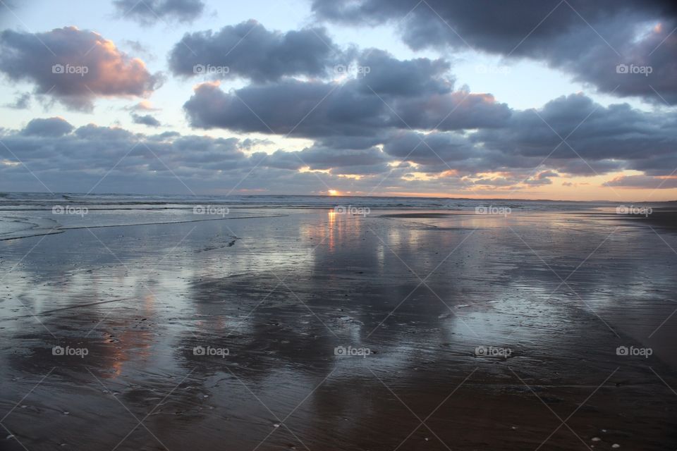 Beach sunset reflections.