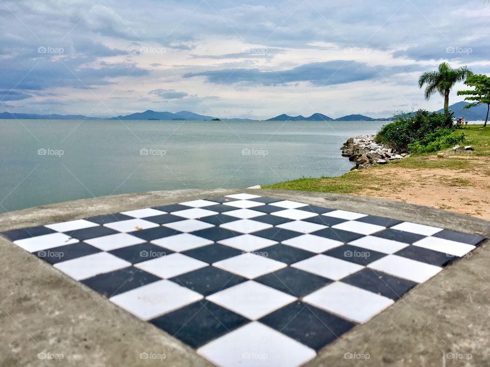 Chess table on beach