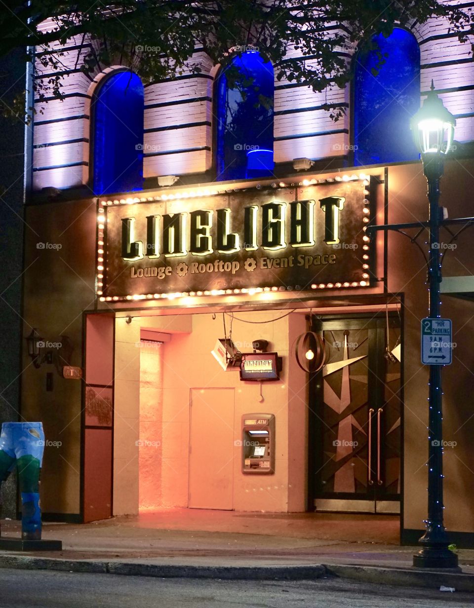 The Limelight club all lite up nice orange and violet colors.