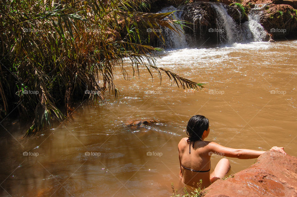 Enjoying the Ouzoud Falls. The colour of the water is due to clay in the riverbeds