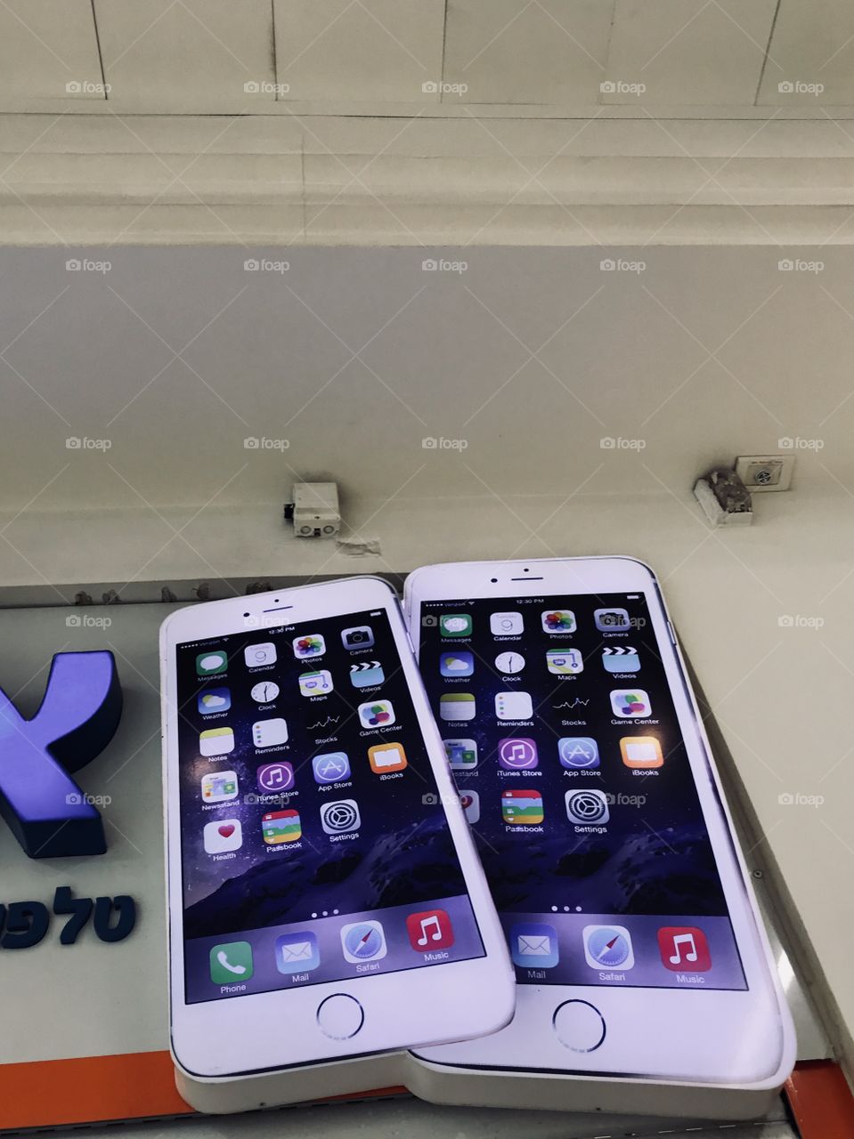Massive iphones on the wall 