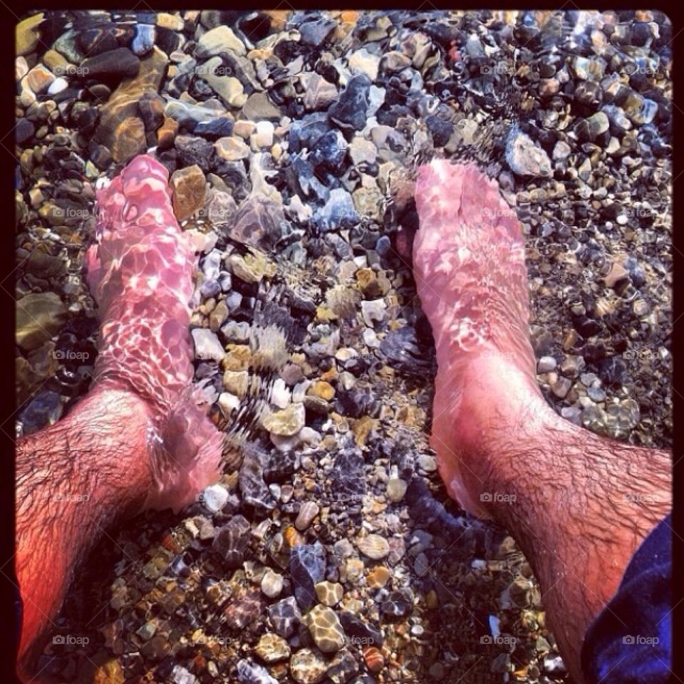 Feet in water