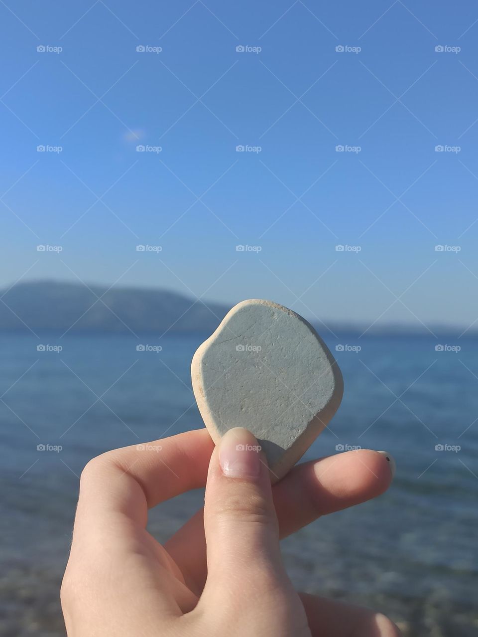 heart shaped stone on the beach