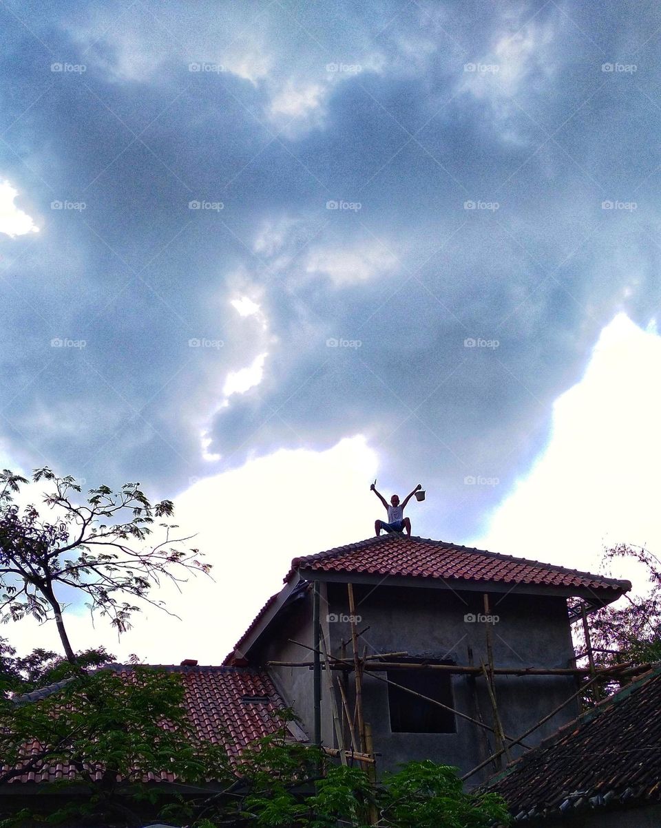 The person above is precarious