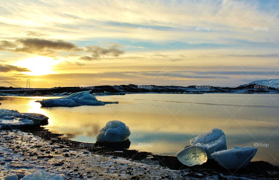 glacier lagoon in Iceland. giant blocks of ice crystal floating on lake mirror