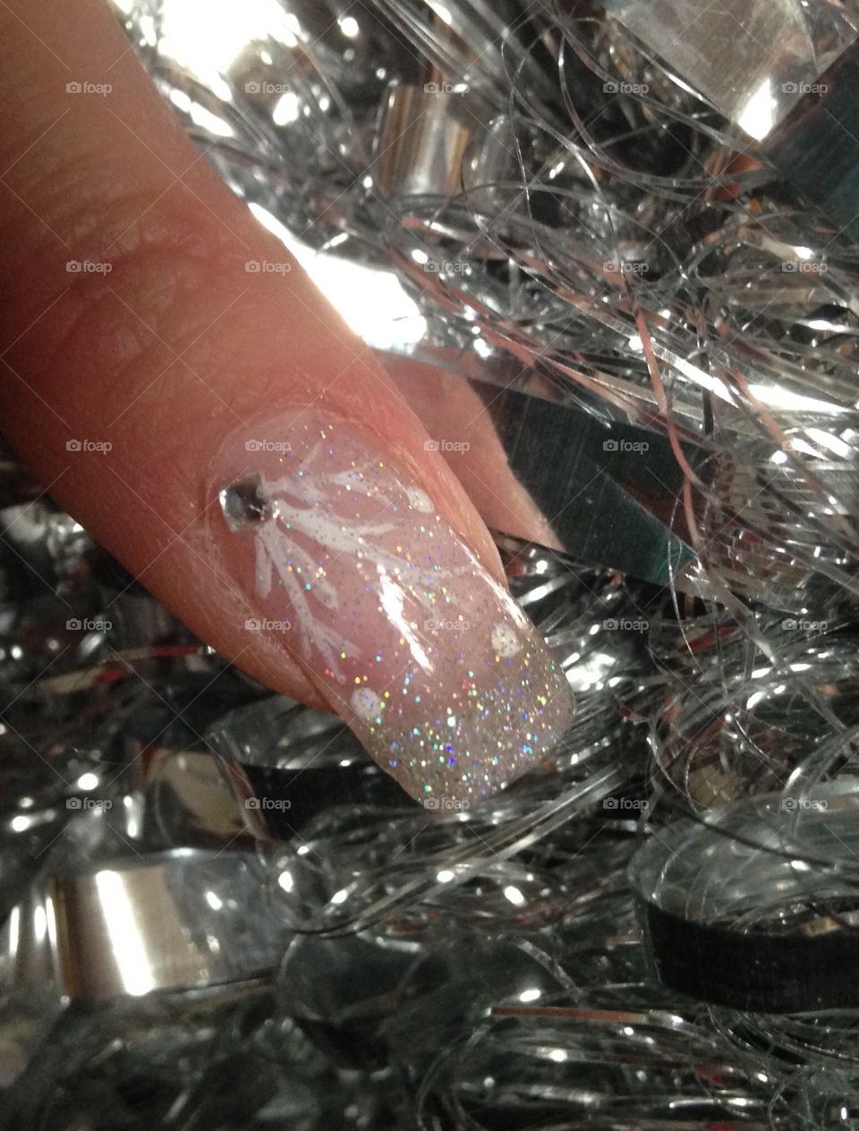 Nail art with Silver tinsel background 