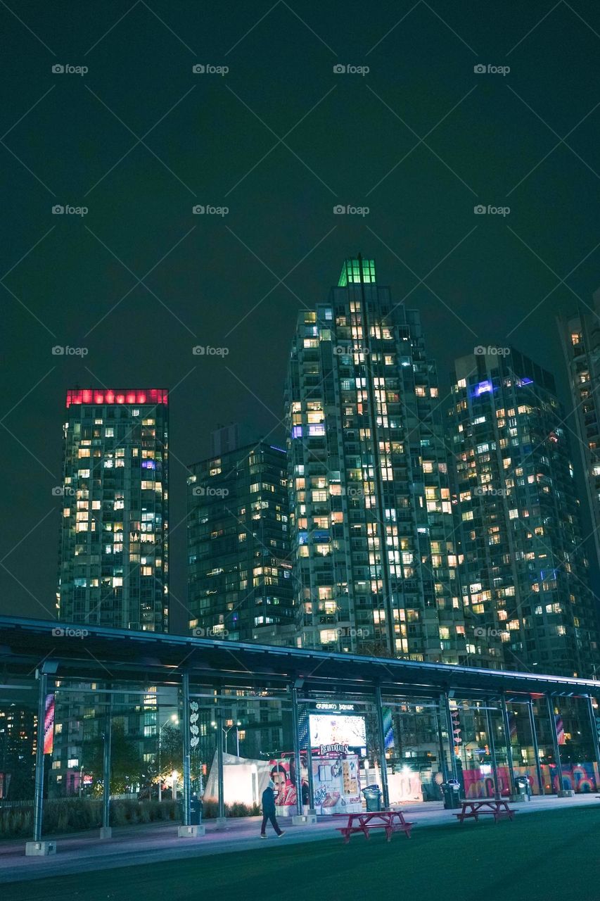 man walking in a big city