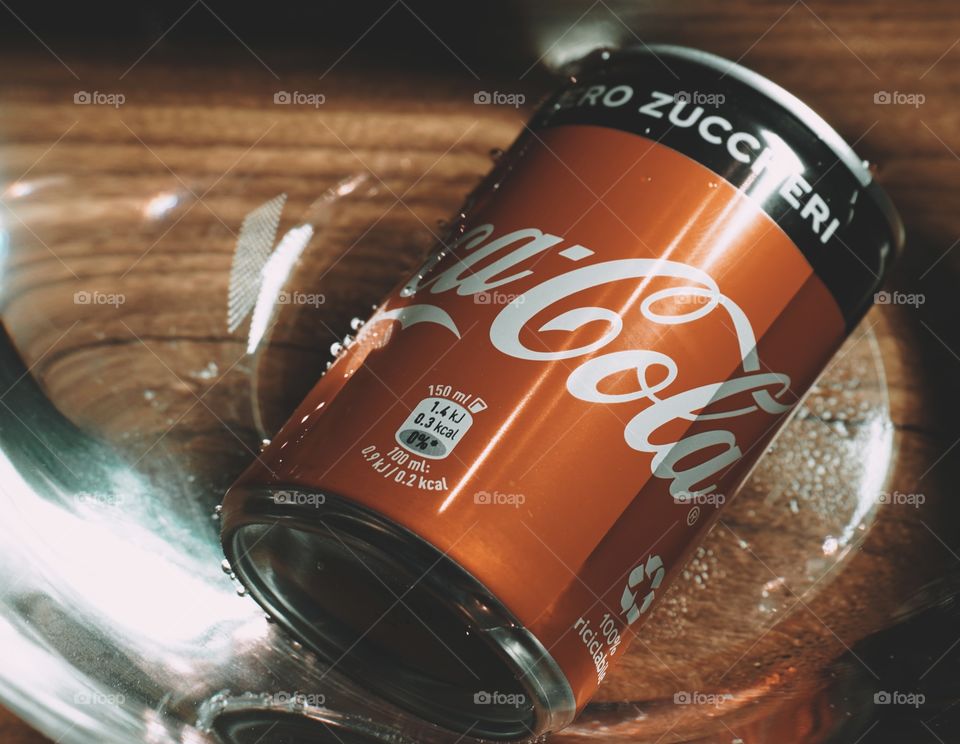 Chilled can of Coca-Cola in water