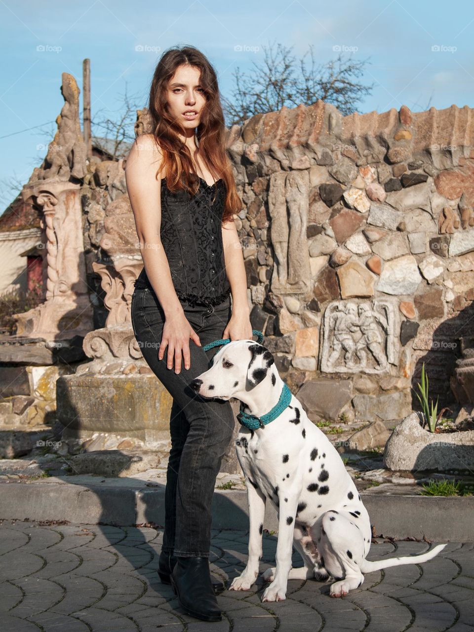 Summer in the city with puppy Dalmatian 