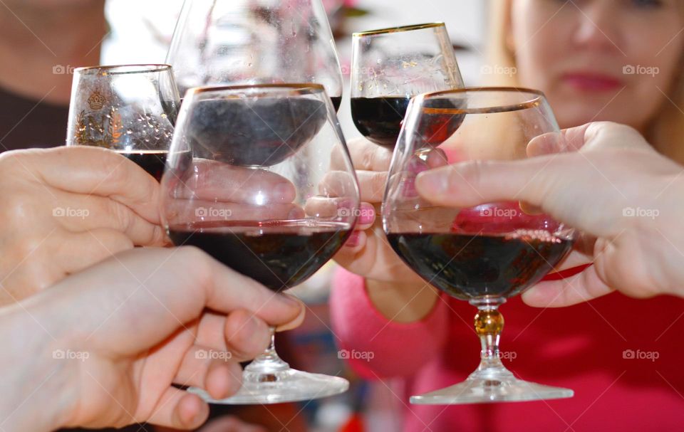 drinking wine glasses in the hands