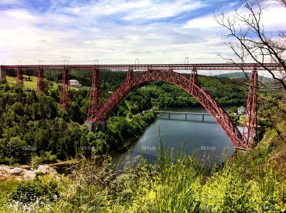 Railway arch bridge named Viaduc de Garabit in France.