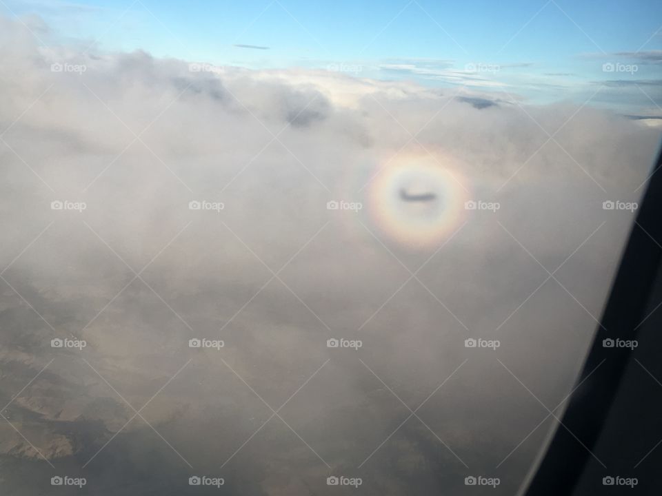 Rainbow circle in the clouds
