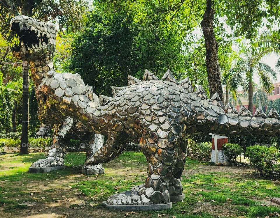 Dinasour made of round scrap plates