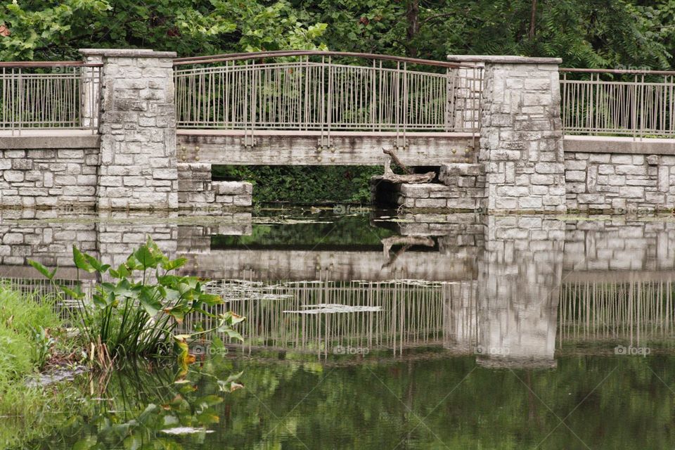 Bridge reflecting in the pond