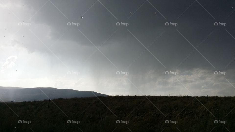 Rain storm coming across the rolling grasslands