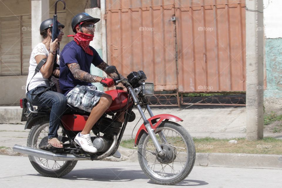 Cuban People.Moto Taxi