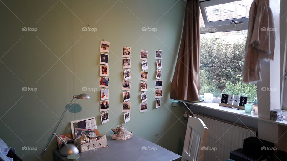 Creative student dorm room photo wall