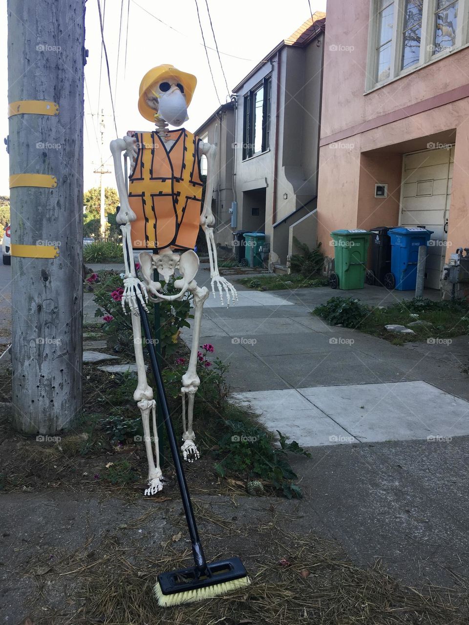 Skelton on residential street at Halloween 