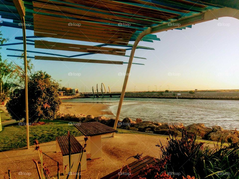 Empty bench near the sea side