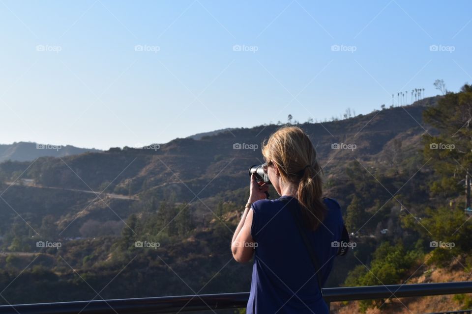 watching through a binocular