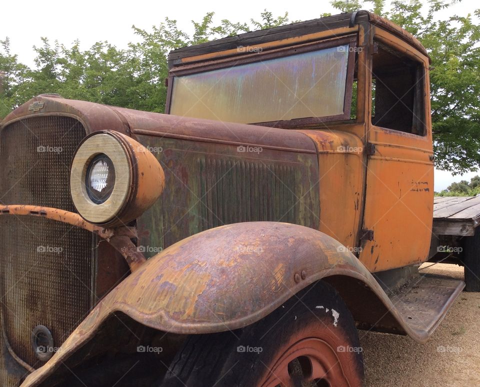 Old yellow Chevy truck. Old yellow Chevy truck