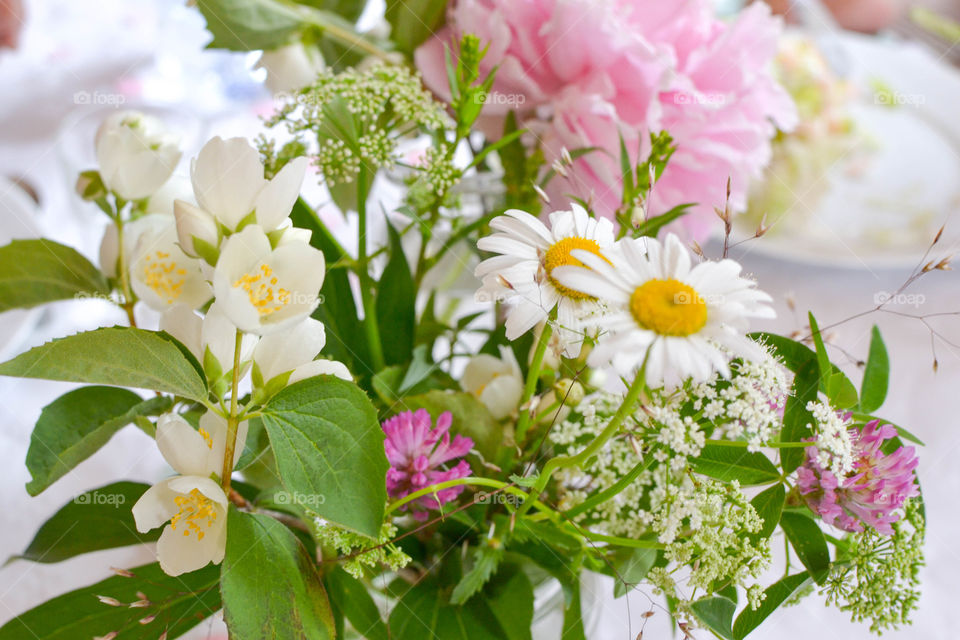 Hand picked wild flowers as table decorations