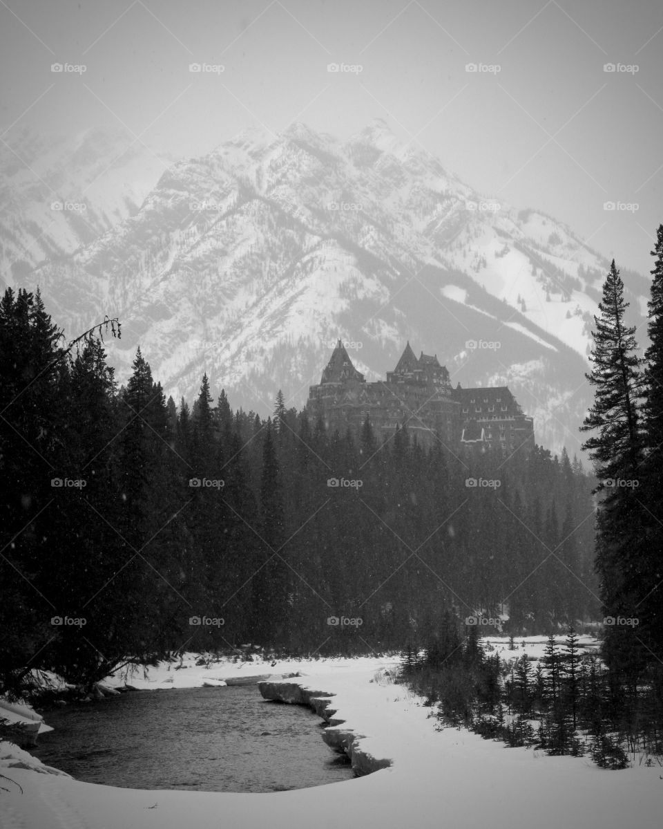 Looking up at the Banff Springs Hotel on a snowy day, Banff, Alberta