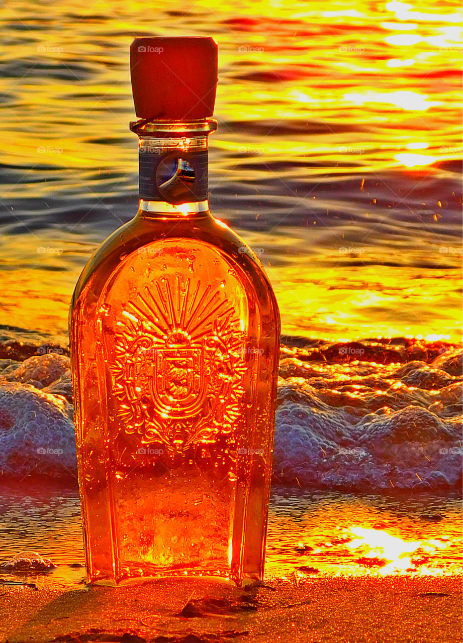 Sunset in a decorative bottle!
The sun was sinking behind the horizon, but left behind a magnificent sunset that cast its shimmering rays across the Choctawhatchee Bay