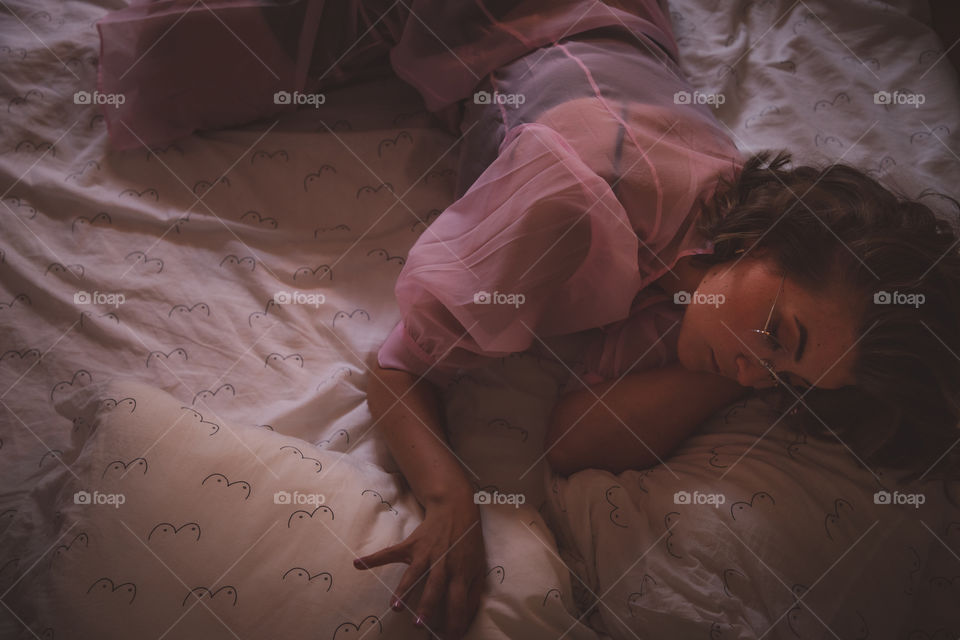 Girl relaxing in bed