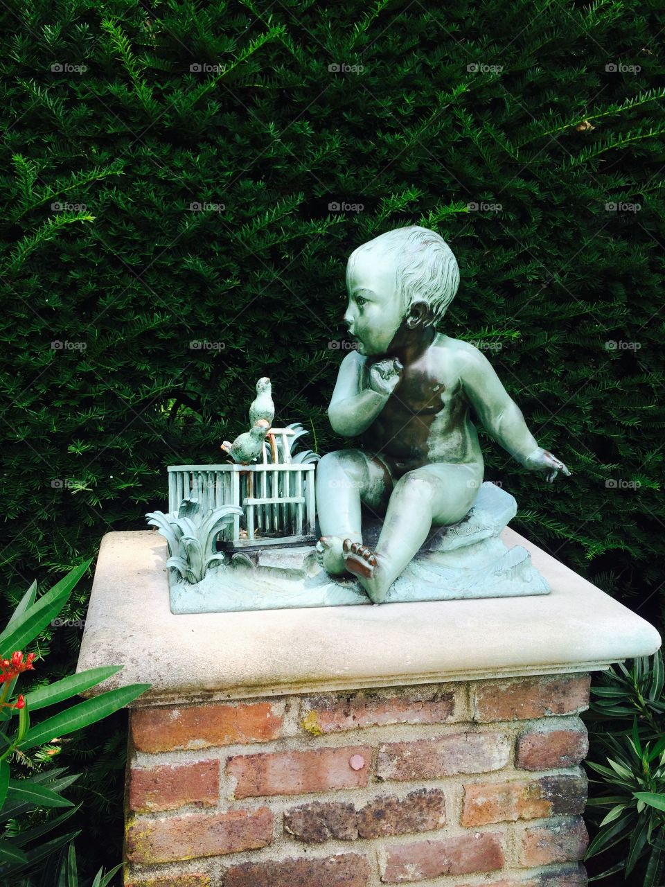 Baby and bird statue 