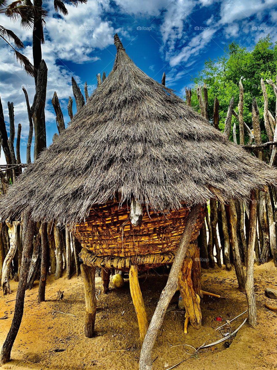 This thatch roofed ornament is our storage for mahangu at the farm. African huts are the signature homes, lodges for African people. The round part is made of timber, bound and folded while fresh.