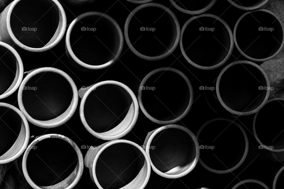 Hollow tube in black and white with half sunlight