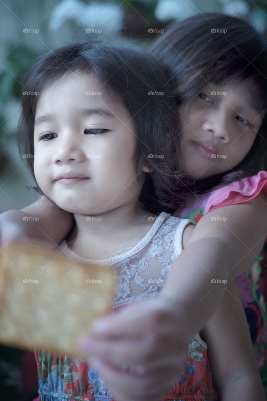 My two little girls Aurea and Bianca, this picture's taken with my sony A6000 combine with meike 35mm f/1.7 manual lense