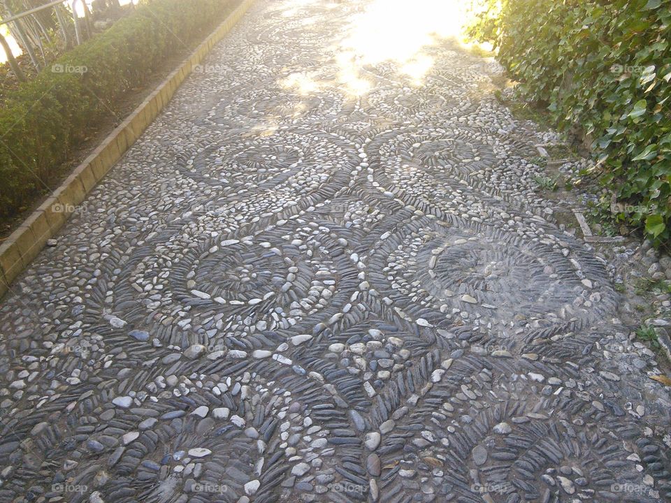 Outdoor stone filigrane floor in Generalife gardens
