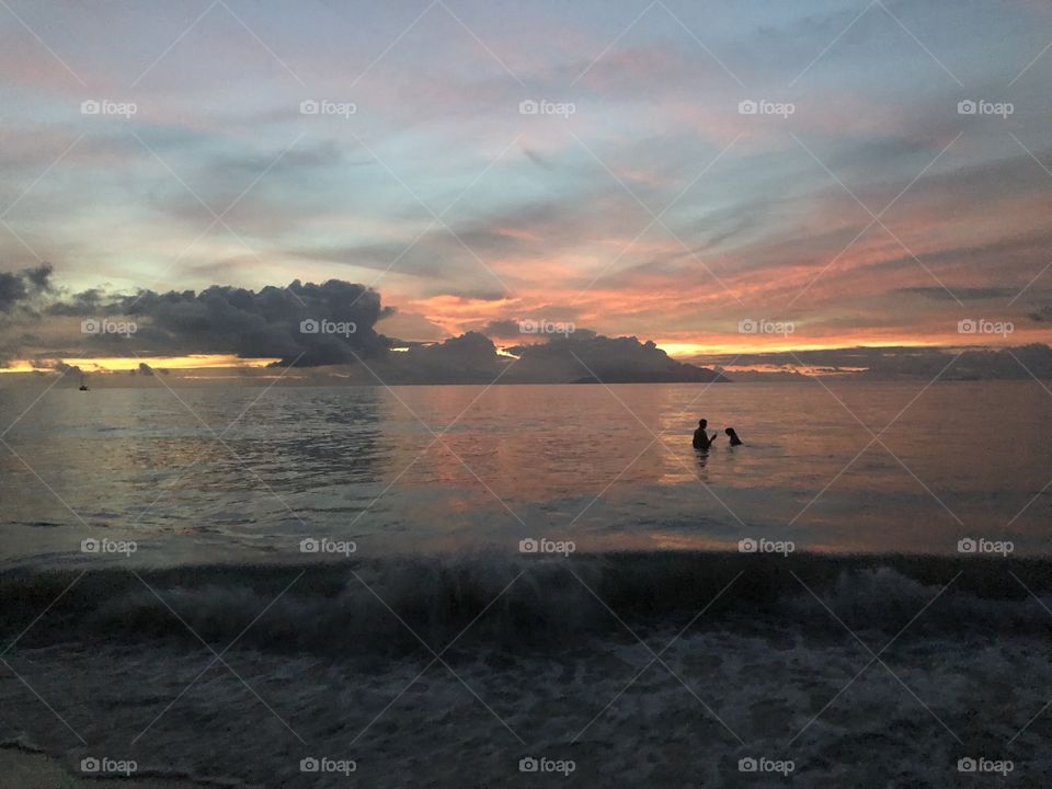 Sundown swim Beau Vallon Seychelles 