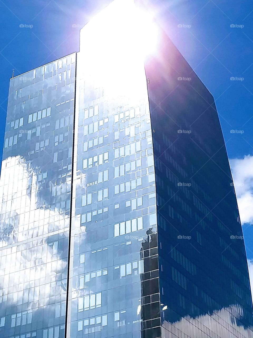 Mirrored building with sun reflection