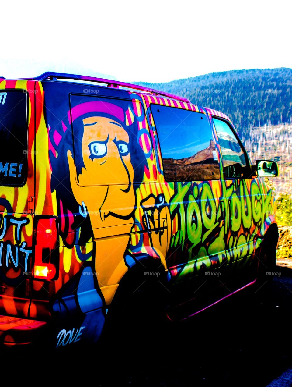 A sharp color painted car in the nature in glacier national park