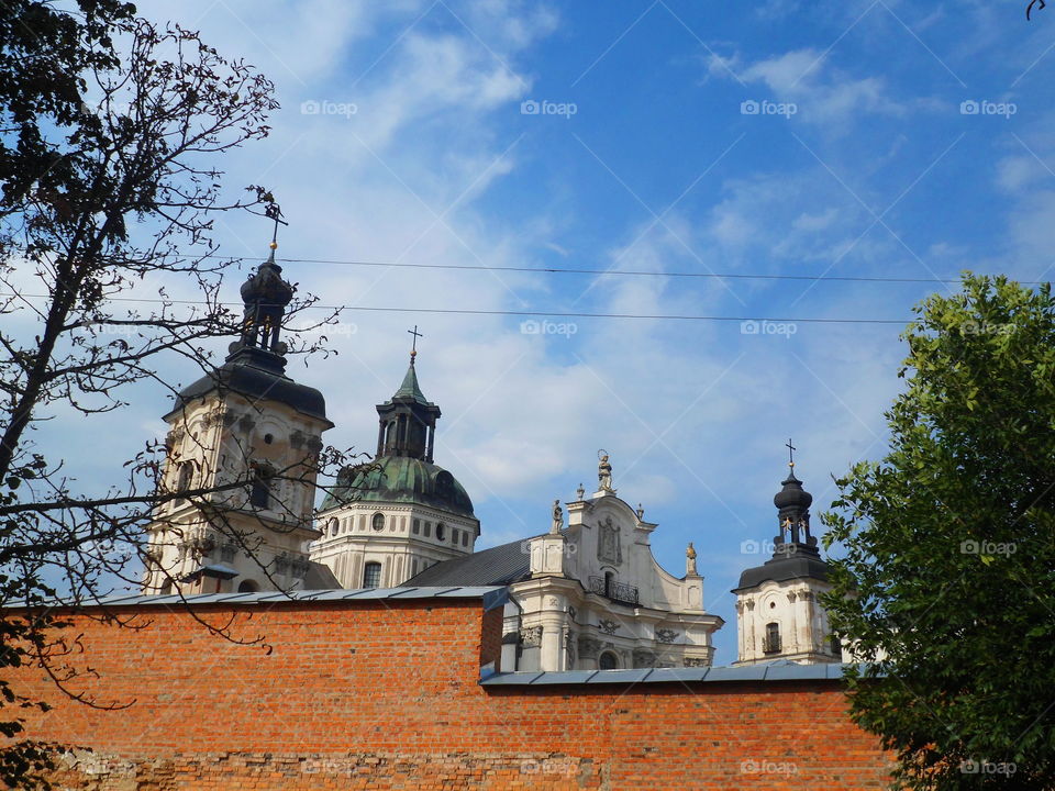 The striking monastery-fortress of the Order of the Barefoot Carmelites in Berdichev. A striking unexpected complex with powerful fortress walls, several towers, a church, a monastery, a bell tower, shops. All this was built here in 1642!