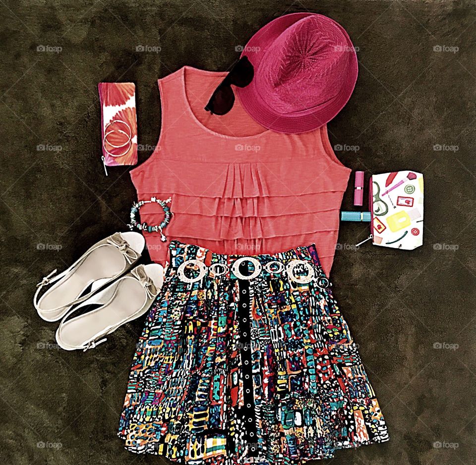 Flat lay of a complete woman’s outfit.