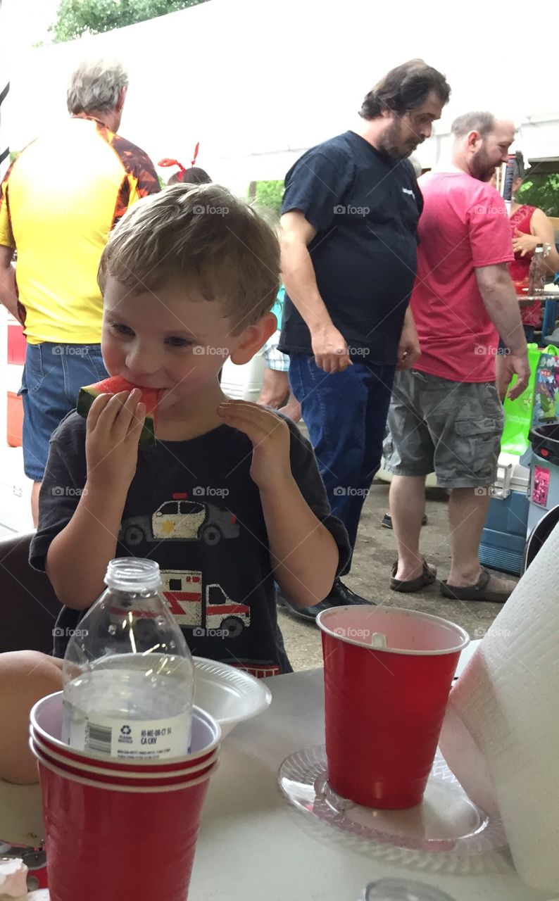 My nephew eating his favorite-watermelon!