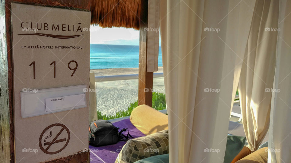 Paradise Awaits - Bali bed with view of the turquoise Caribbean Sea in Cancun Mexico